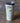 Tumbler with animal illustrations on a textured surface