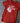 Red t-shirt with 'I Love Lucy' graphic on a stone surface