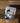 Book titled 'Young Thomas Edison' by Michael Dooling on a wooden surface